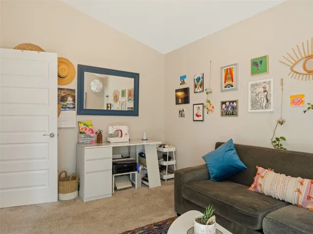 a living room with furniture and a couch