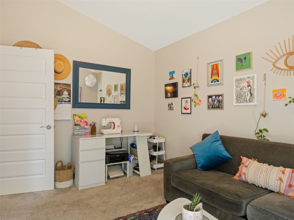 1307 East St Johns Avenue, Unit B Austin, TX 78752 - Photo 18 of 27 a living room with furniture and a couch