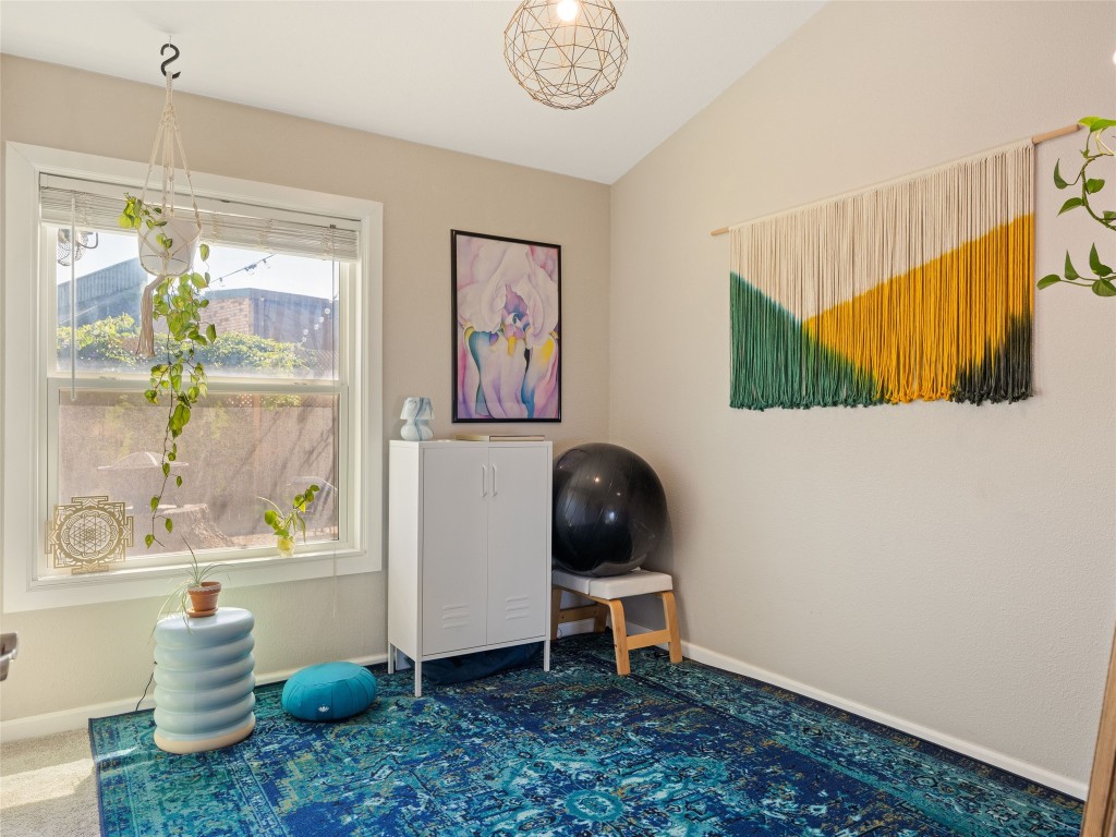 1307 East St Johns Avenue, Unit B Austin, TX 78752 - Photo 21 of 27 a view of table and chair in a room