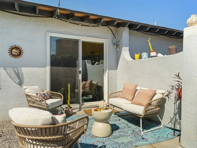 a outdoor living space with furniture and outdoor view