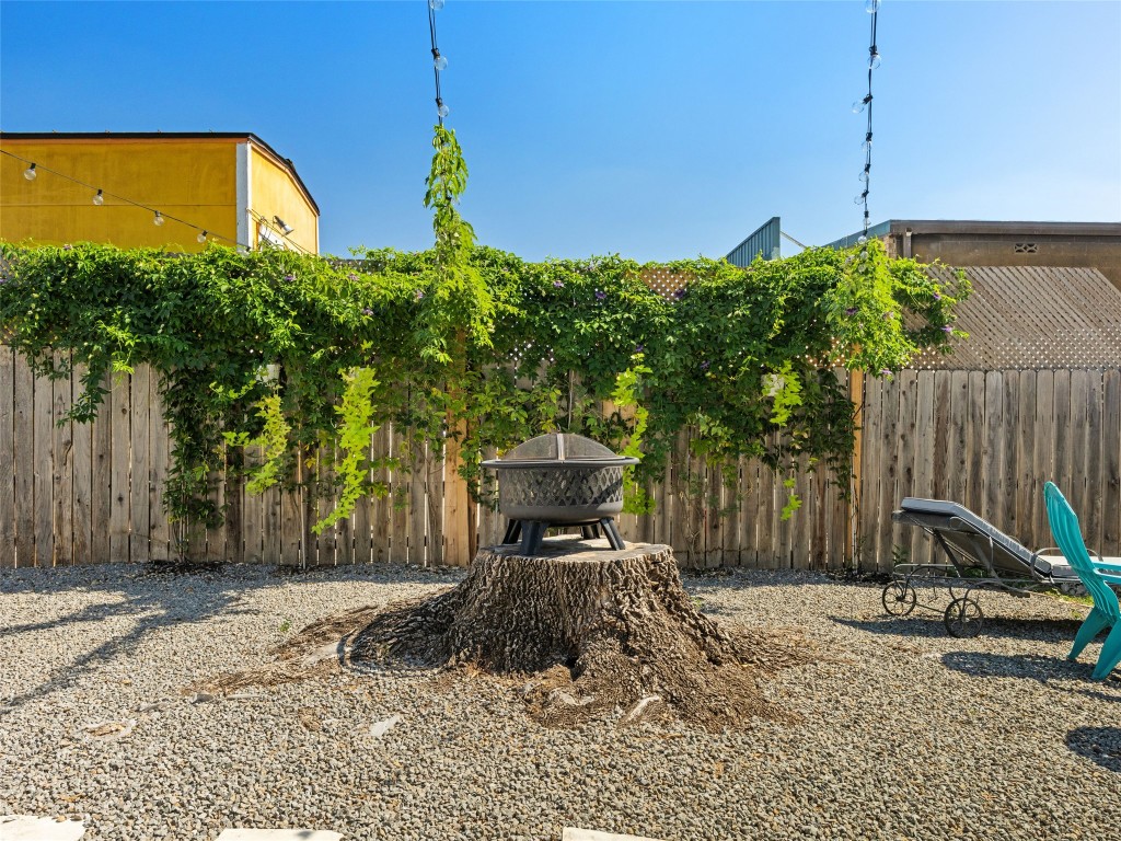 1307 East St Johns Avenue, Unit B Austin, TX 78752 - Photo 26 of 27 a front view of a house with garden