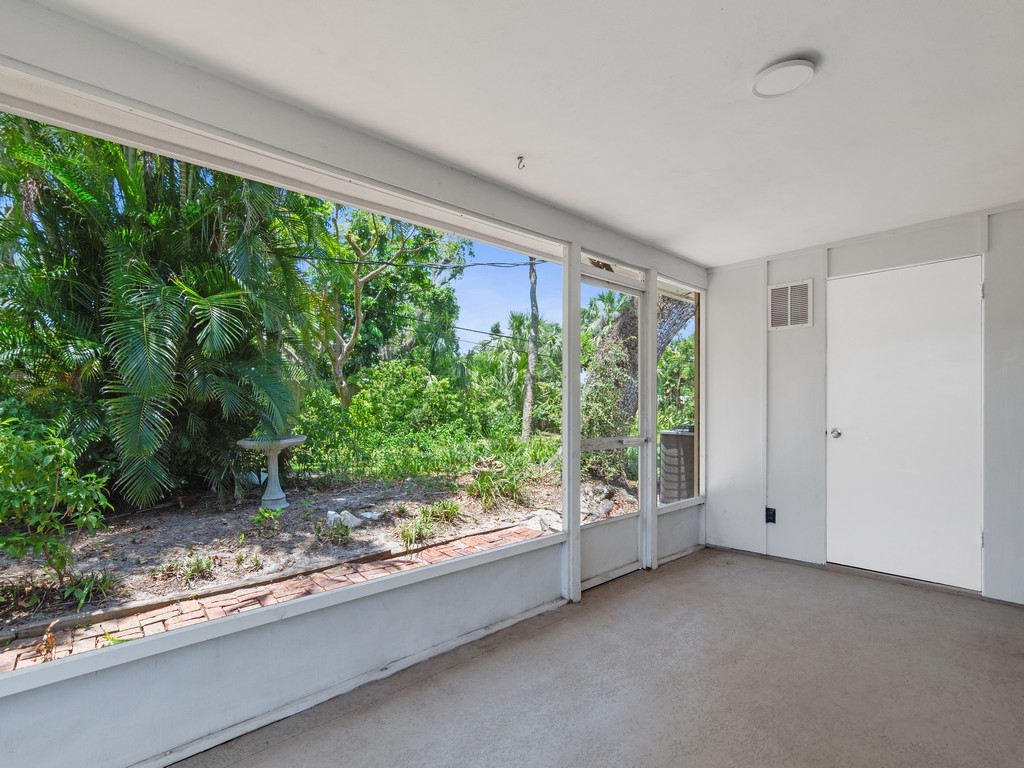 546-556 Azalea Lane Vero Beach, FL 32963 - Photo 13 of 18 a view of a garden from a window