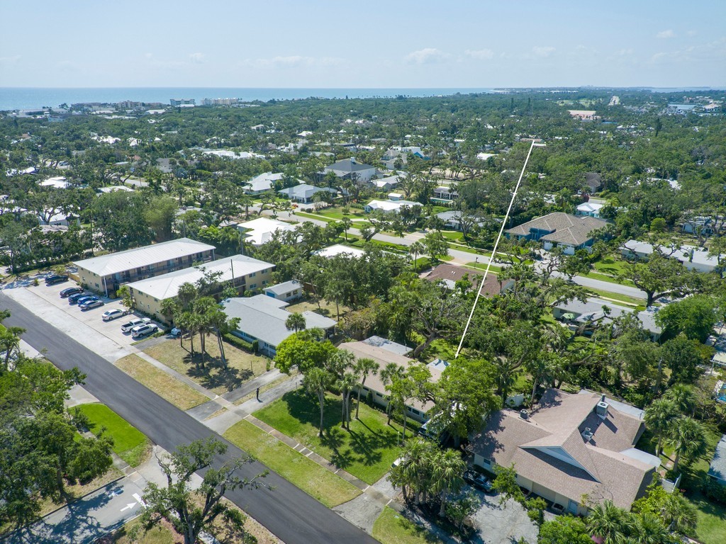 546-556 Azalea Lane Vero Beach, FL 32963 - Photo 3 of 18 an aerial view of residential houses with city view