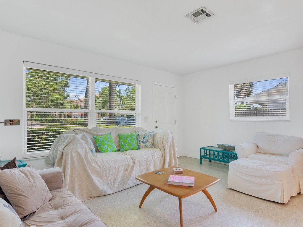 546-556 Azalea Lane Vero Beach, FL 32963 - Photo 7 of 18 a living room with furniture and a large window