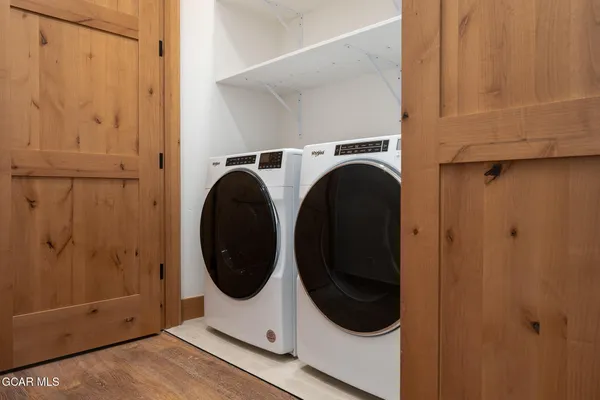 a utility room with dryer and washer