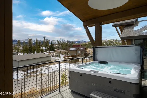 a view of swimming pool from a balcony