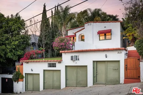a view of a house with a garage