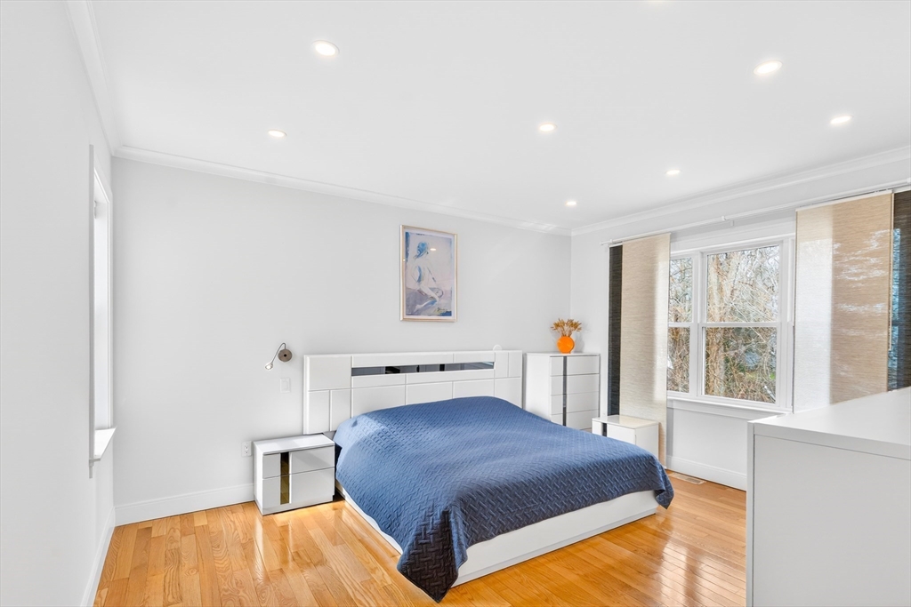 93 Alden Street Dedham, MA 02026 - Photo 11 of 41 a bedroom with a bed and a window