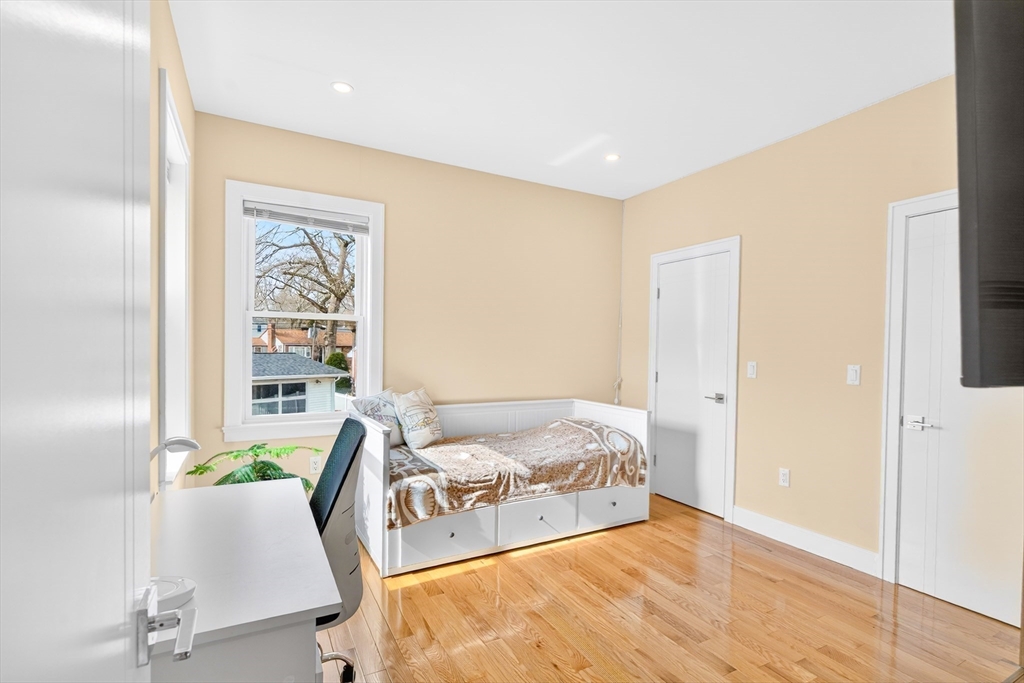 93 Alden Street Dedham, MA 02026 - Photo 24 of 41 a bedroom with a bed and with furniture
