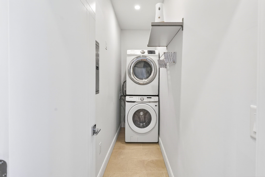93 Alden Street Dedham, MA 02026 - Photo 33 of 41 a utility room with dryer and washer