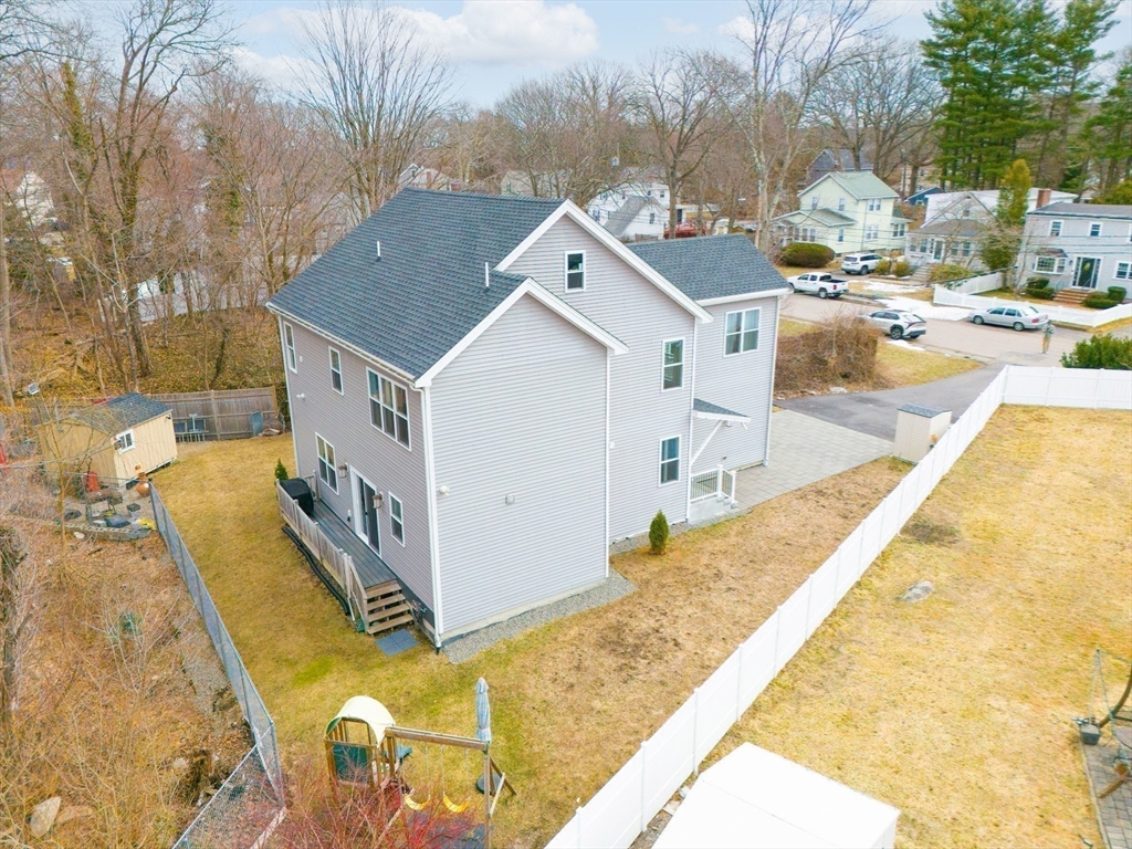 93 Alden Street Dedham, MA 02026 - Photo 38 of 41 a view of a house with a swimming pool