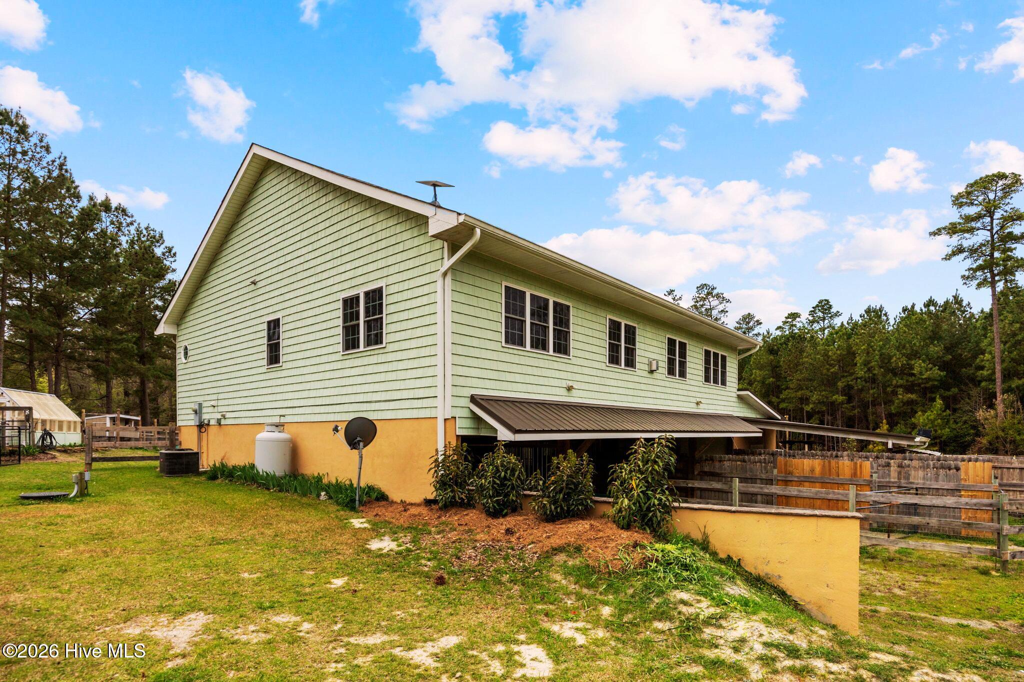 230 Causey Road Vass, NC 28394 - Photo 18 of 42 House Side View