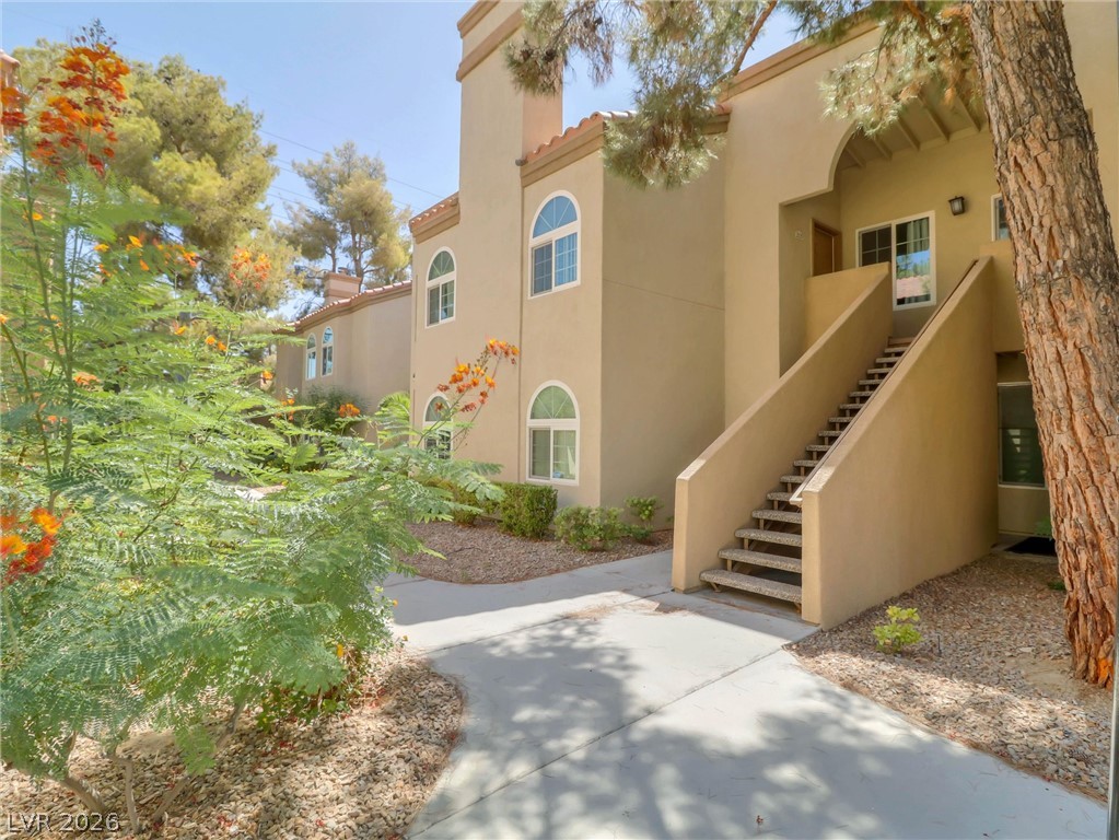 3145 East Flamingo Road, Unit 2129 Las Vegas, NV 89121 - Photo 1 of 43 The Mediterranean-inspired architecture and mature landscaping invite residents into this charming multi-story building.