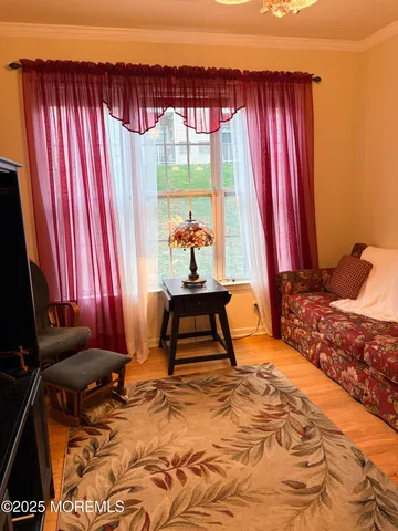 a room with a bed and a window