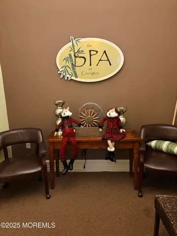 a front view of a livingroom with furniture