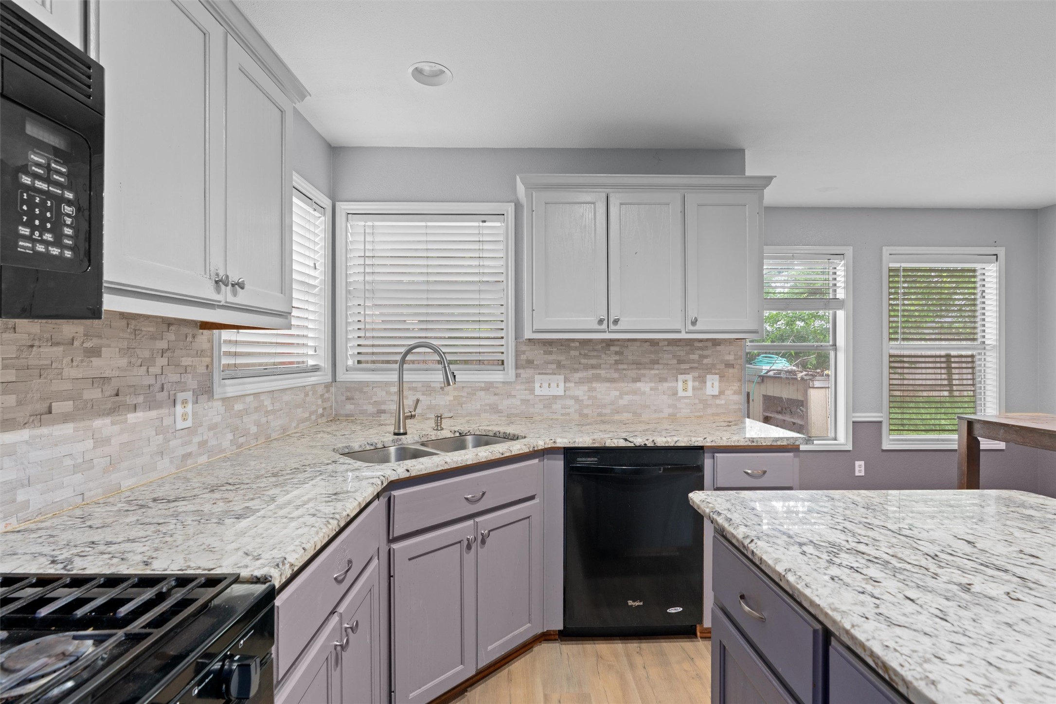 2306 Raintree Path Round Rock, TX 78664 - Photo 11 of 23 Culinary enthusiasts will adore this kitchen with generous counter space and seamless transitions.
