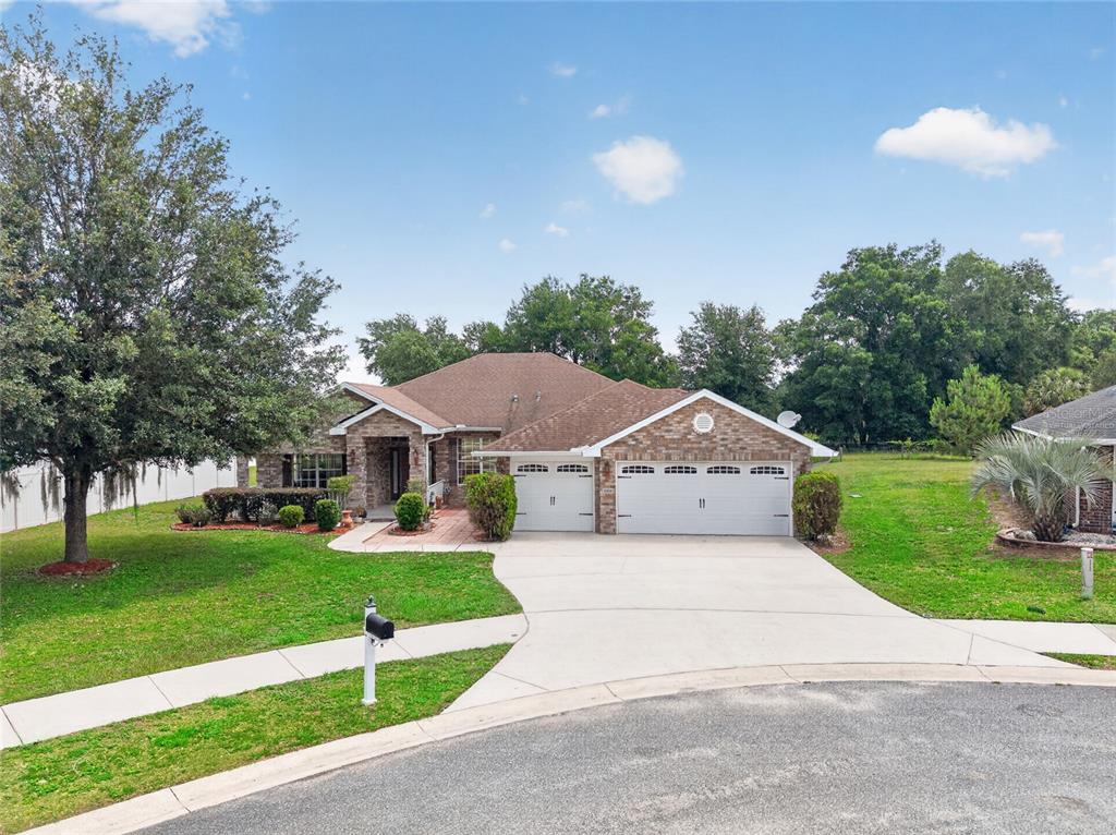 4319 Southwest 63rd Street Ocala, FL 34474 - Photo 3 of 29 a front view of house with yard and green space
