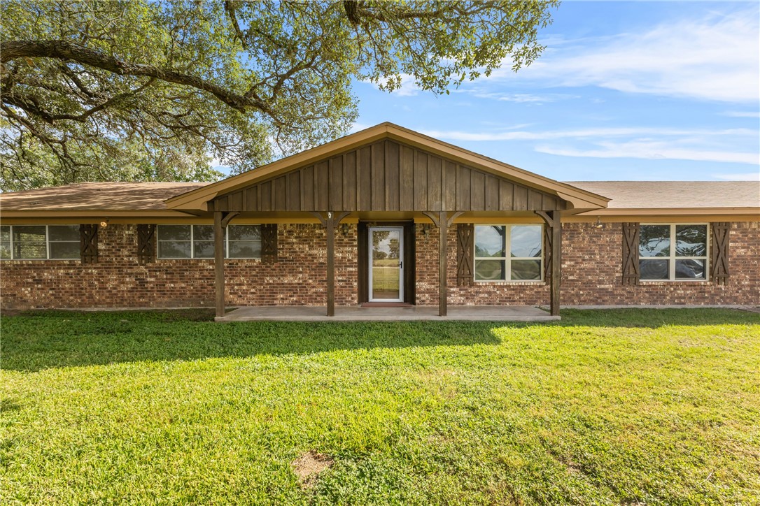 12331 Fm 2155 Somerville, TX 77879 - Photo 2 of 35 a front view of a house with swimming pool having outdoor seating