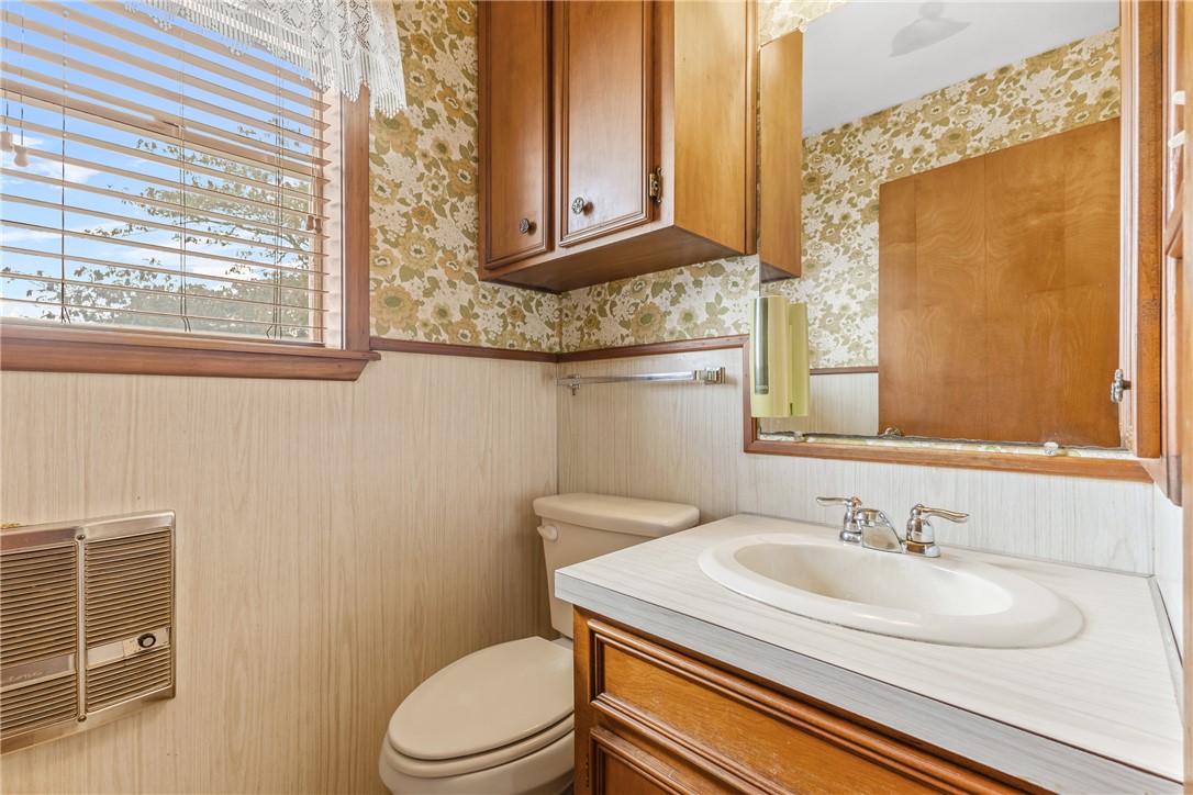 12331 Fm 2155 Somerville, TX 77879 - Photo 30 of 35 a bathroom with a sink a toilet and a window