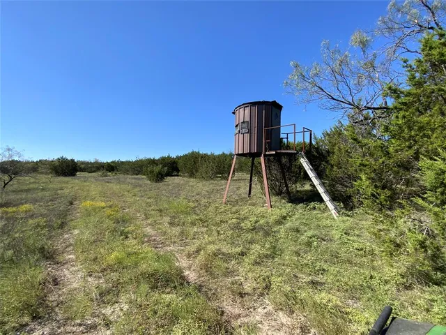 a view of a lake with a garden