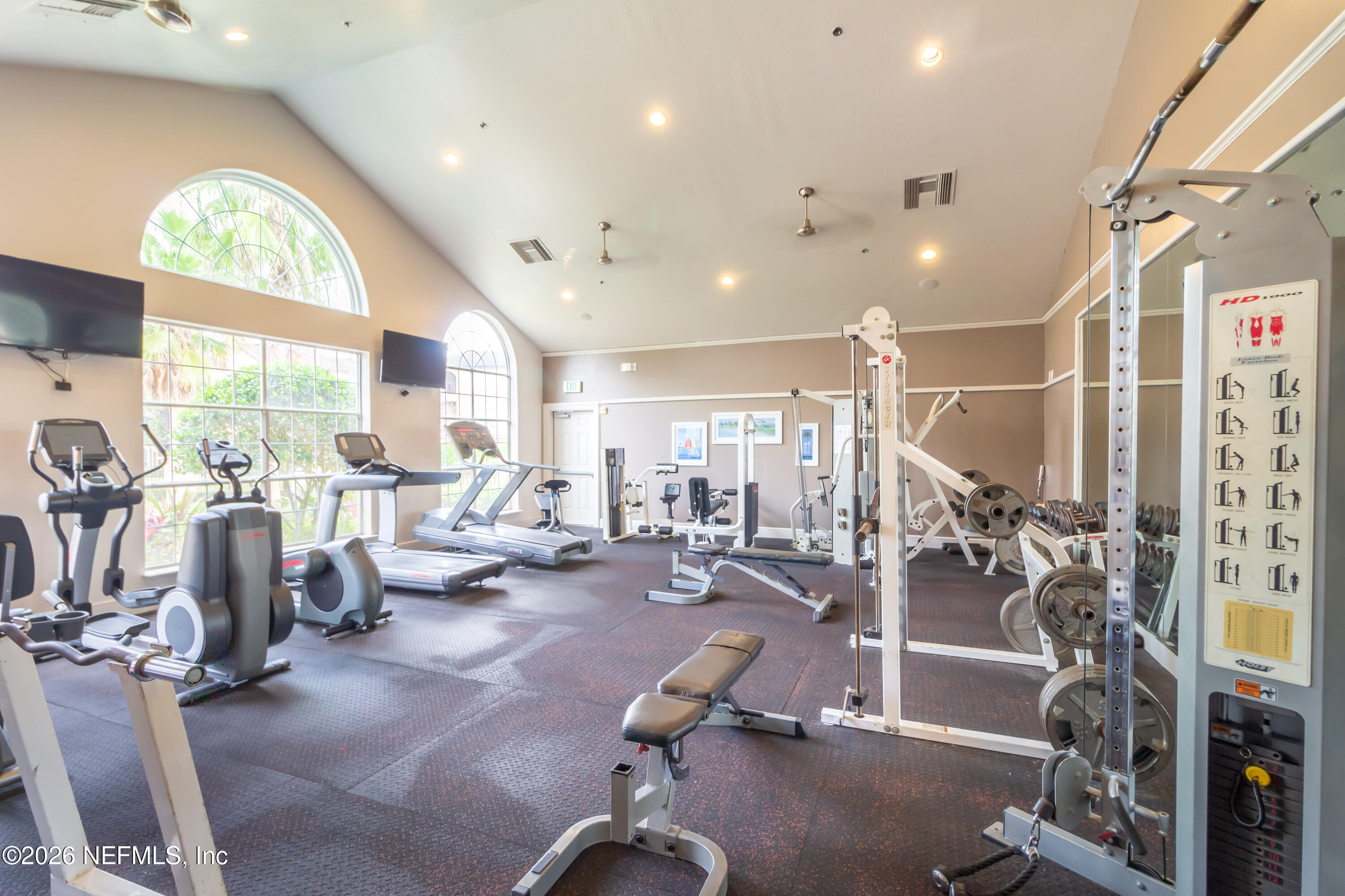 10961 Burnt Mill Road, Unit 225 Jacksonville, FL 32256 - Photo 13 of 17 a view of a room with gym equipment