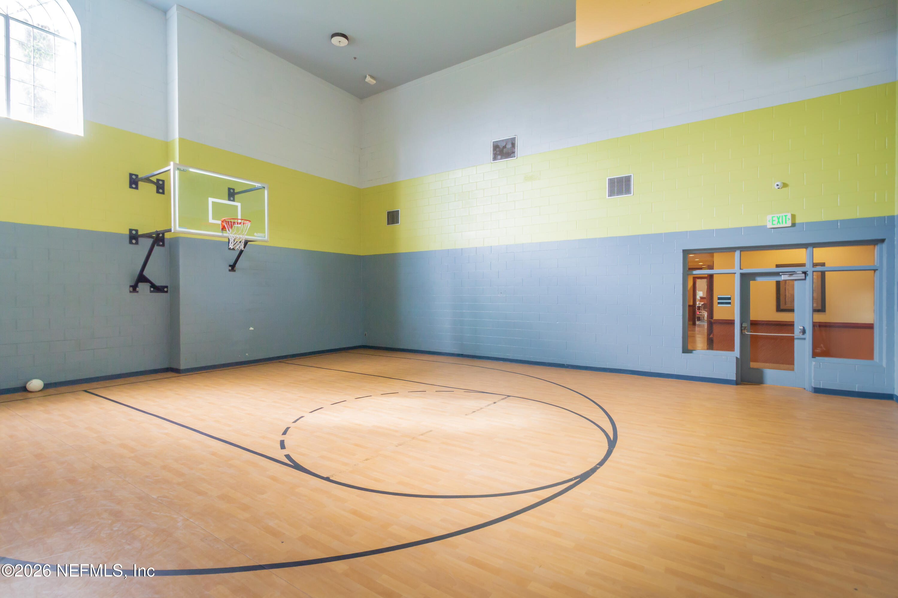 10961 Burnt Mill Road, Unit 225 Jacksonville, FL 32256 - Photo 14 of 17 a view of a room with gym equipment