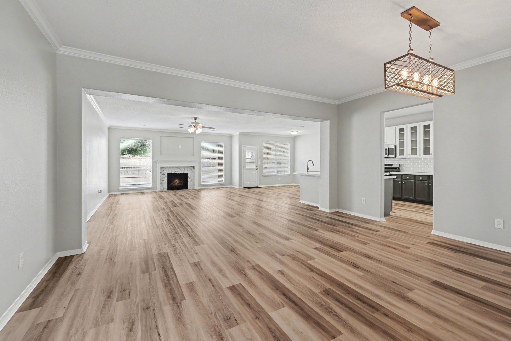 22310 Lamaster Lane Spring, TX 77373 - Photo 11 of 48 From the foyer, you're brought into the dining room that transitions beautifully to the living room. The kitchen is to the right.