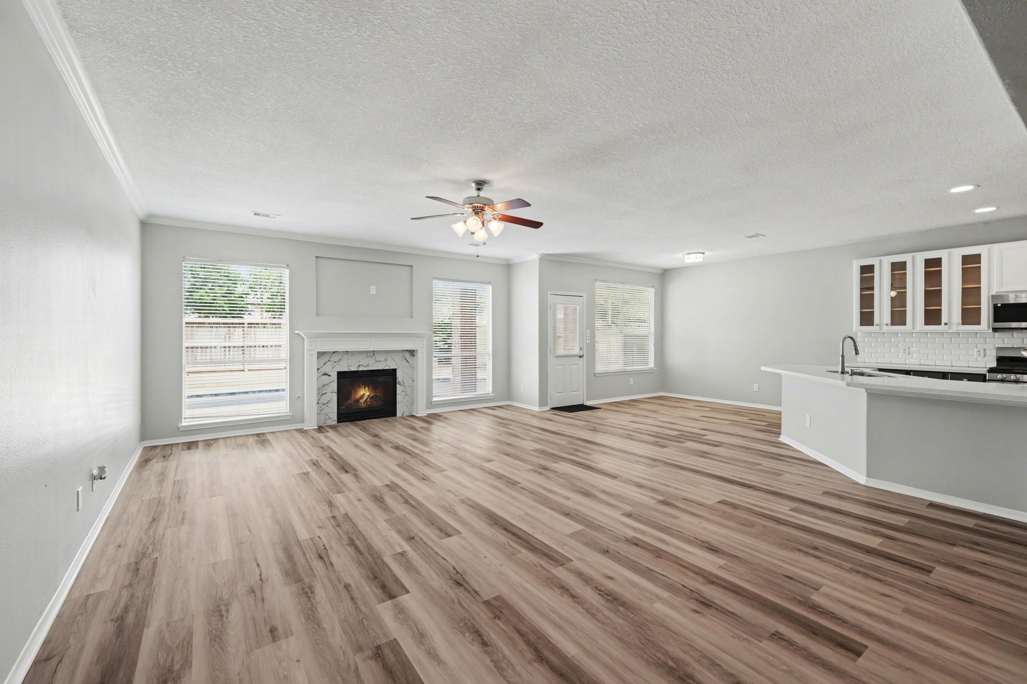 22310 Lamaster Lane Spring, TX 77373 - Photo 24 of 48 Living room with gaslog fireplace.