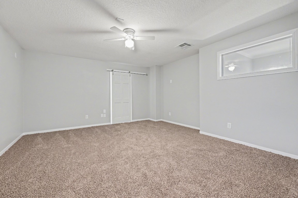 22310 Lamaster Lane Spring, TX 77373 - Photo 33 of 48 Originally the media room, this space is now a bedroom as well, with a huge adjoining closet (that was once a bedroom).