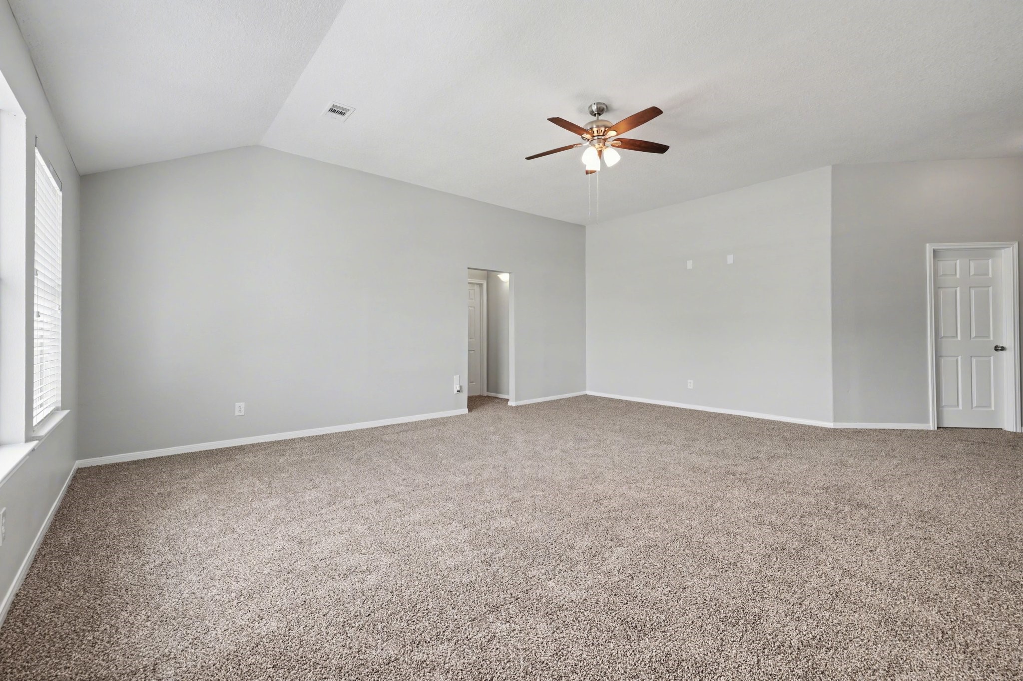 22310 Lamaster Lane Spring, TX 77373 - Photo 39 of 48 The game room with hallway that leads to a full bedroom and bathroom. The door on the right was once the entrance to the media room.
