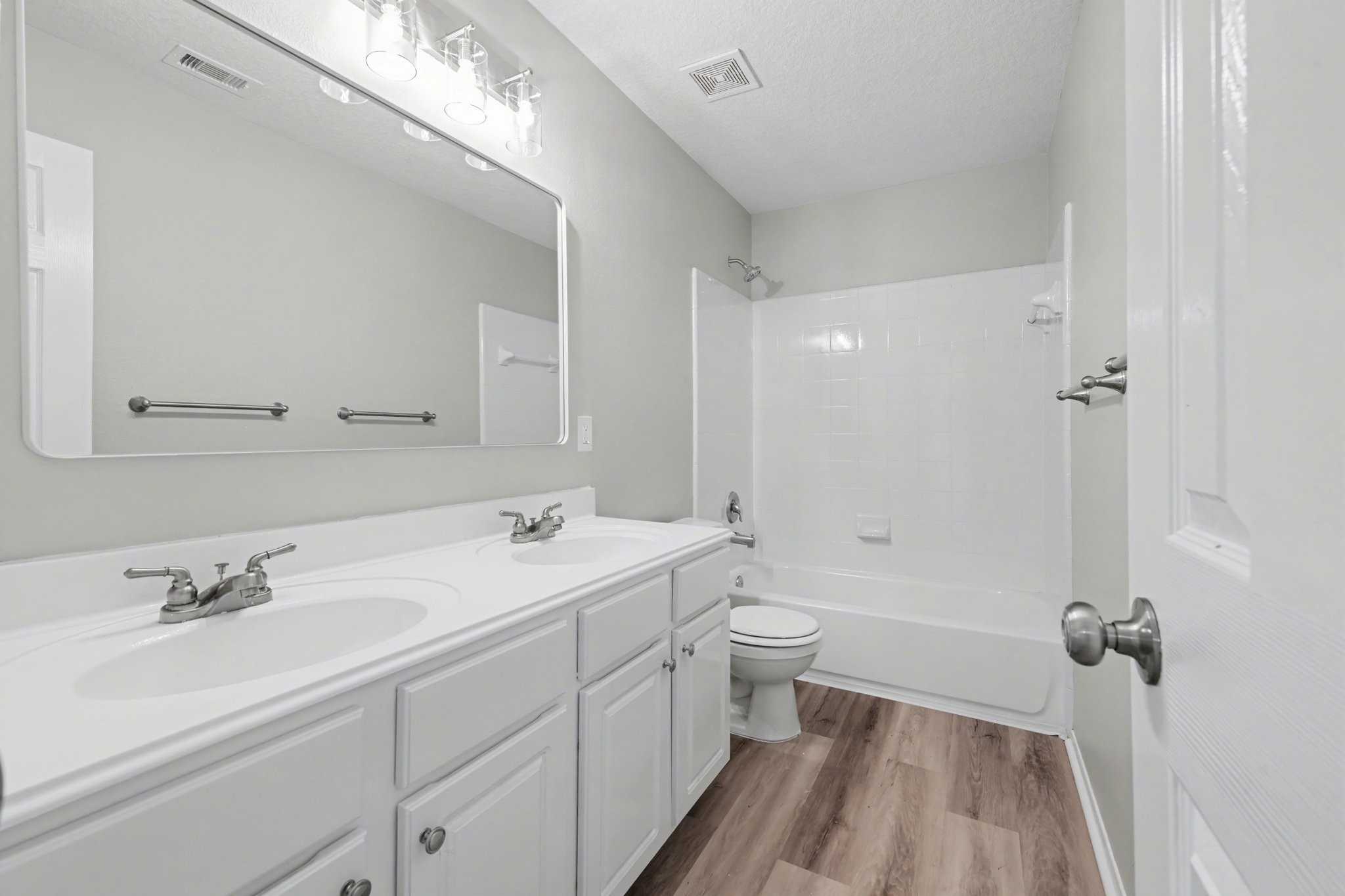 22310 Lamaster Lane Spring, TX 77373 - Photo 41 of 48 Upstairs secondary bathroom with double sinks situated between two secondary bedrooms.