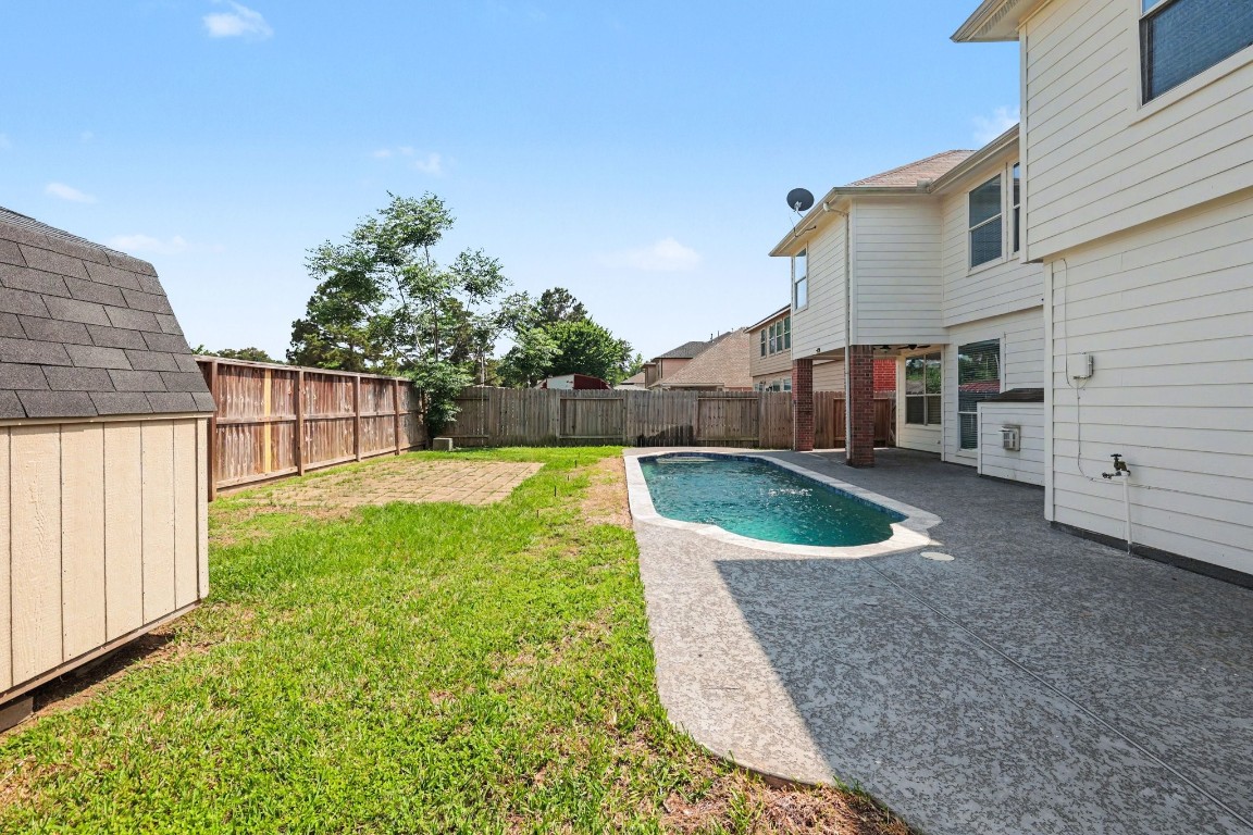 22310 Lamaster Lane Spring, TX 77373 - Photo 48 of 48 With cool deck, outdoor storage, pavers set for lounge set, all you need to add is a grill.