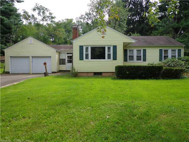 22 Bailey Road Enfield, CT 06082 - Photo 1 of 1 a front view of a house with a yard and garage
