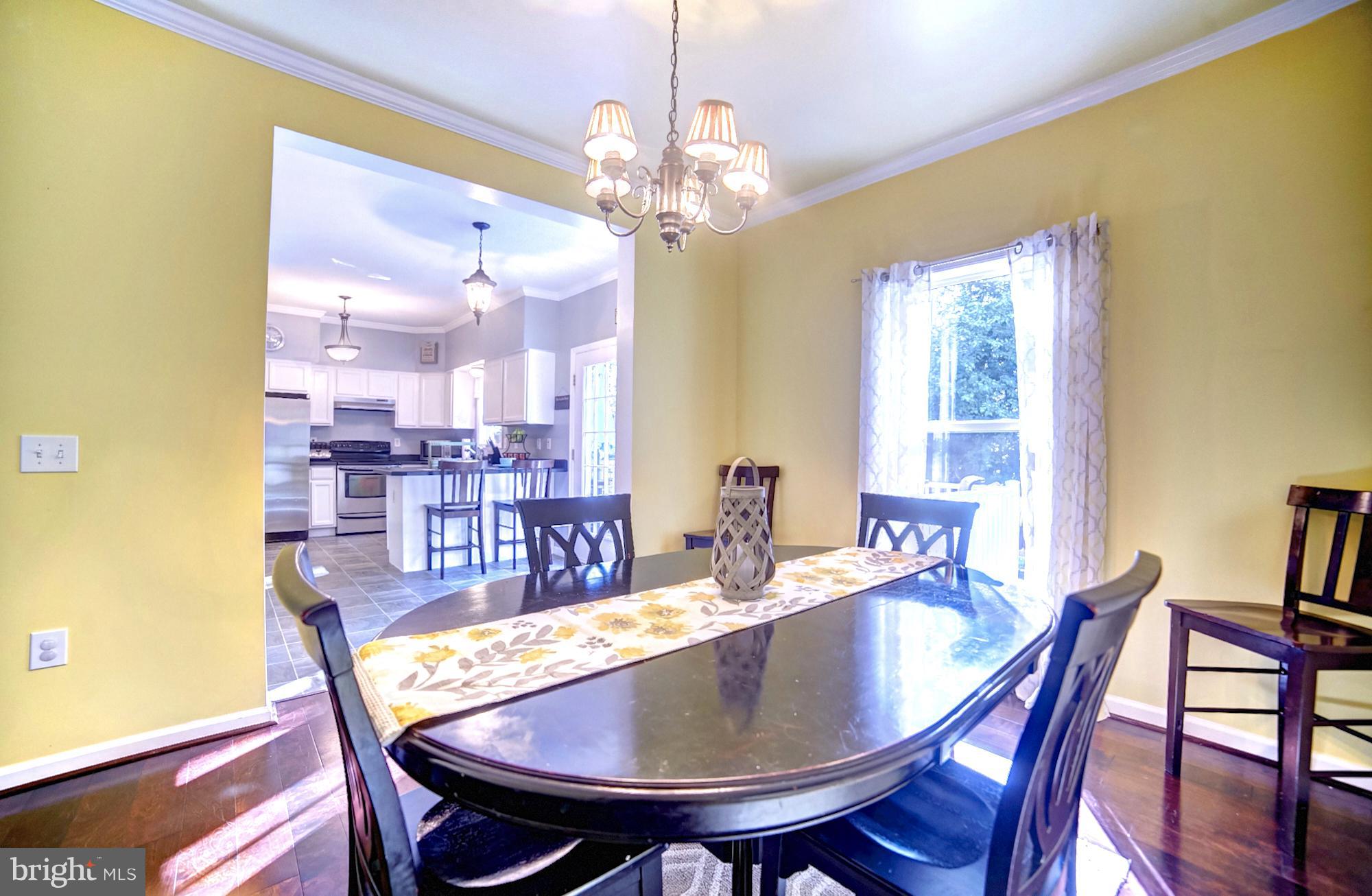 5218 Dewitt Road Baltimore, MD 21227 - Photo 8 of 25 Separate Dining Room for Family Meals
