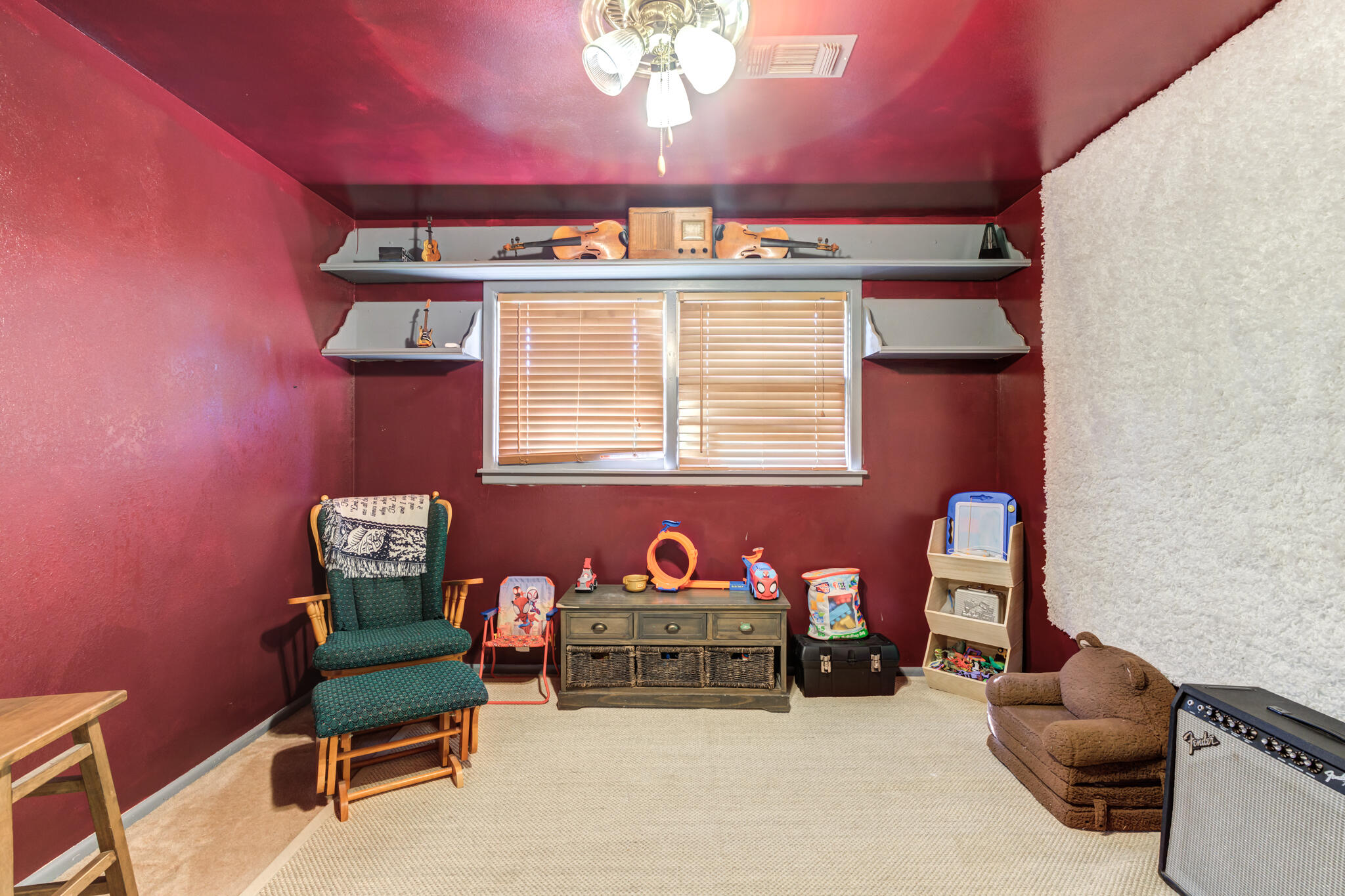 2132 69th Street Lubbock, TX 79412 - Photo 33 of 38 a living room with furniture and a window