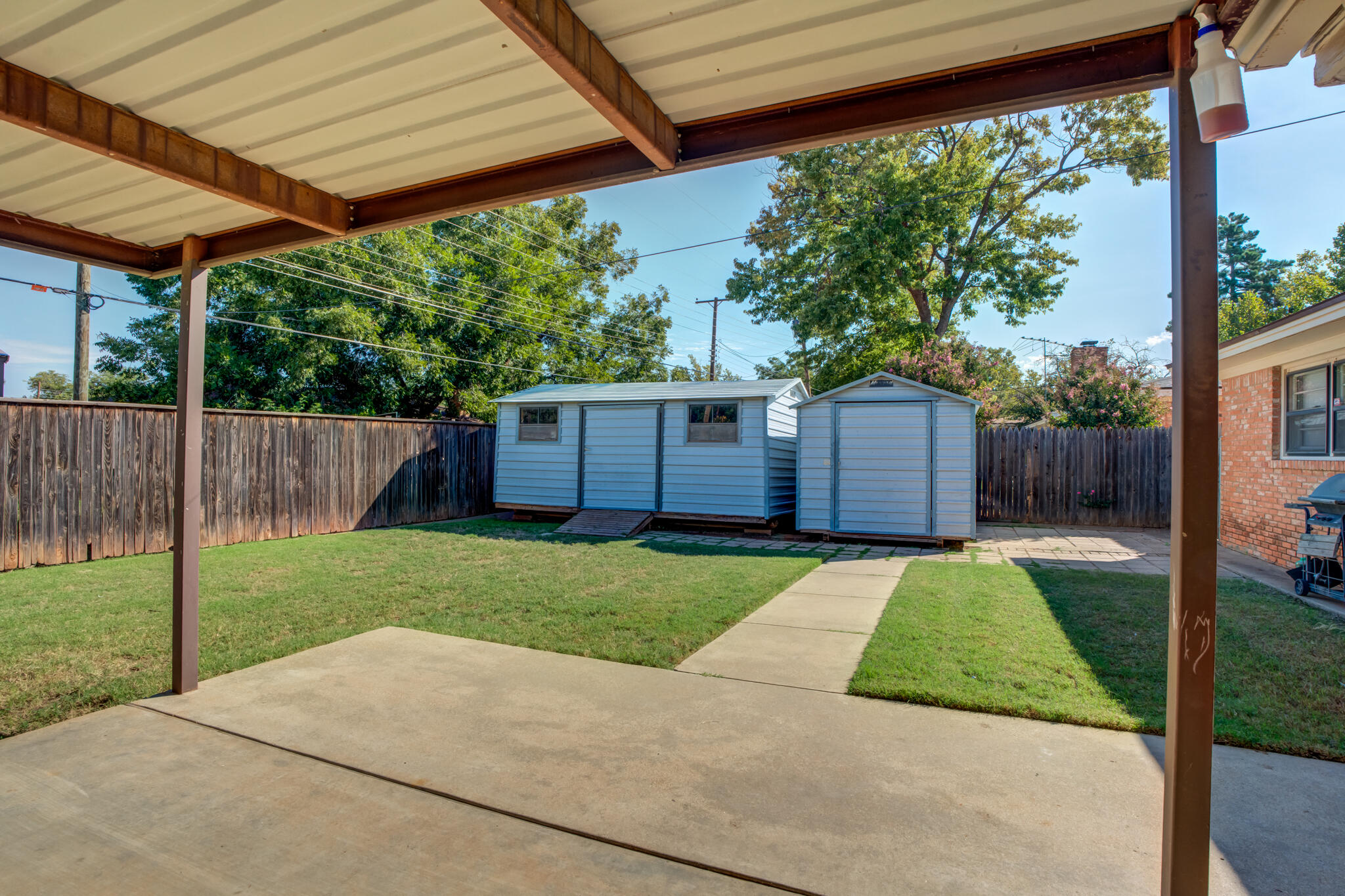 2132 69th Street Lubbock, TX 79412 - Photo 36 of 38 a house view with a backyard space