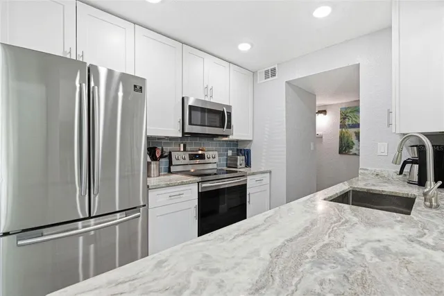 $295,000 | 3775 40th Lane South, Unit G, St. Petersburg, FL 33711