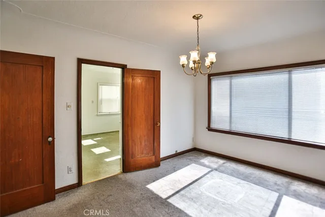 a view of a livingroom with a chandelier