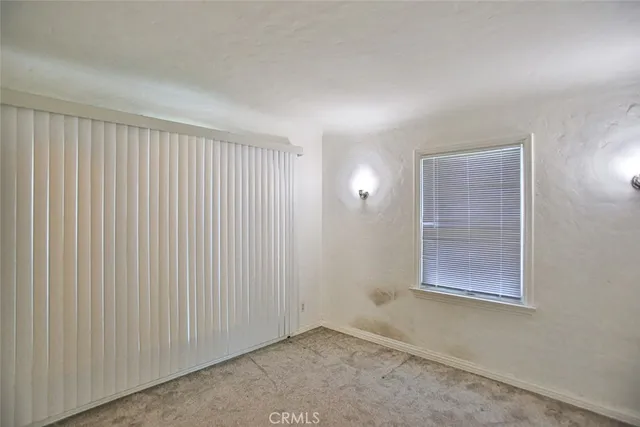 an empty room with closet