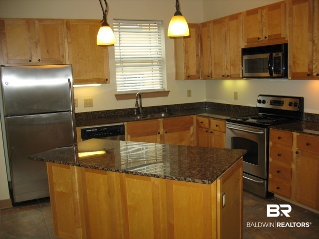 1430 Regency Road, Unit D204 Gulf Shores, AL 36542 - Photo 5 of 18 Granite countertops, stainless appliances, island