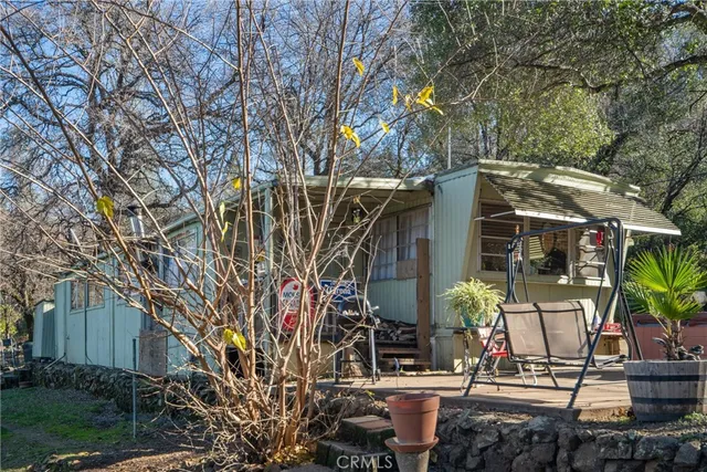 a view of house with outdoor space