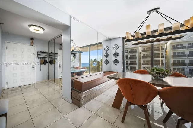 a view of a living room and dining room