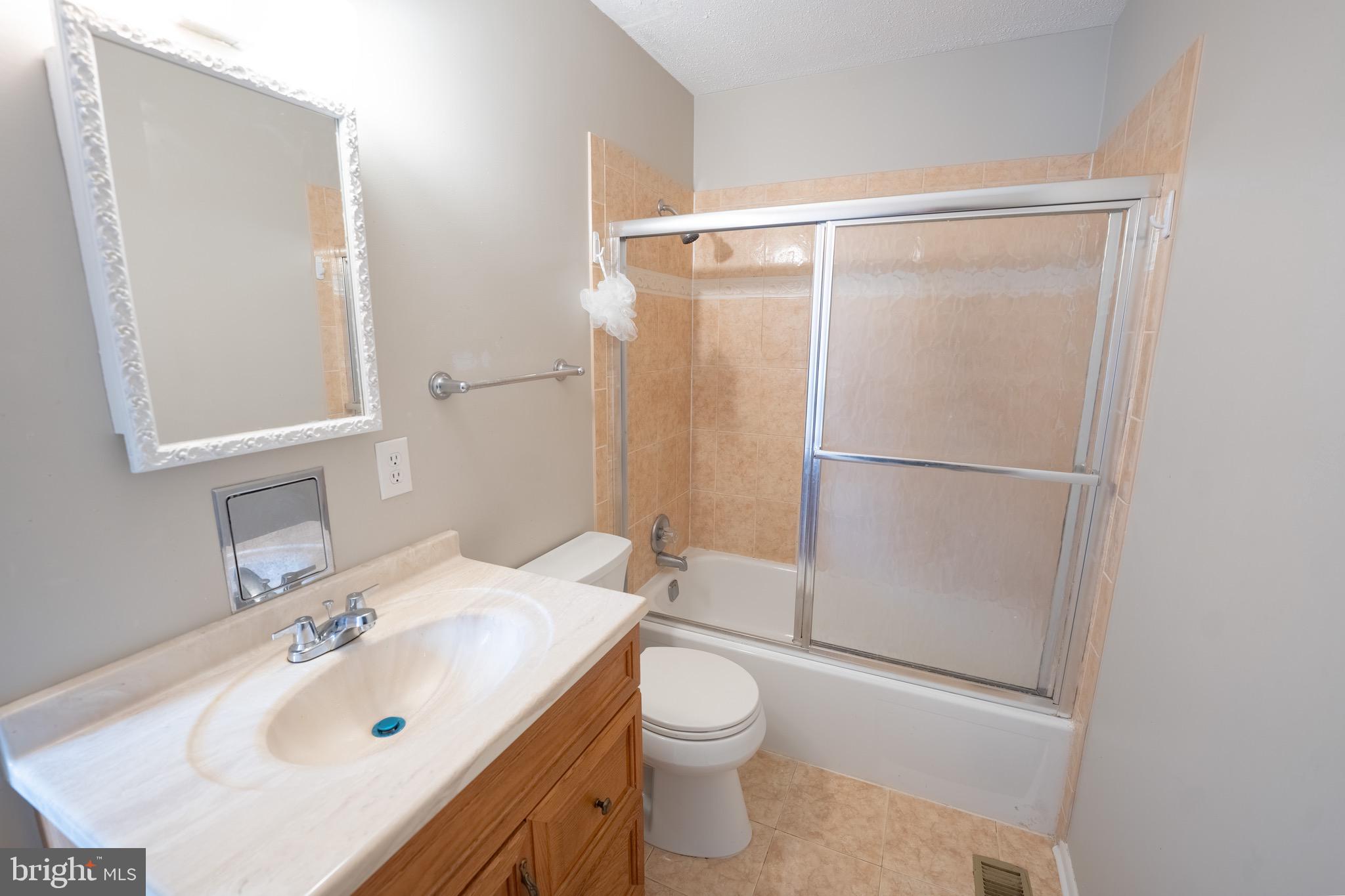 10 Brian Court, Unit 242 Gaithersburg, MD 20877 - Photo 16 of 28 a bathroom with a sink toilet and shower