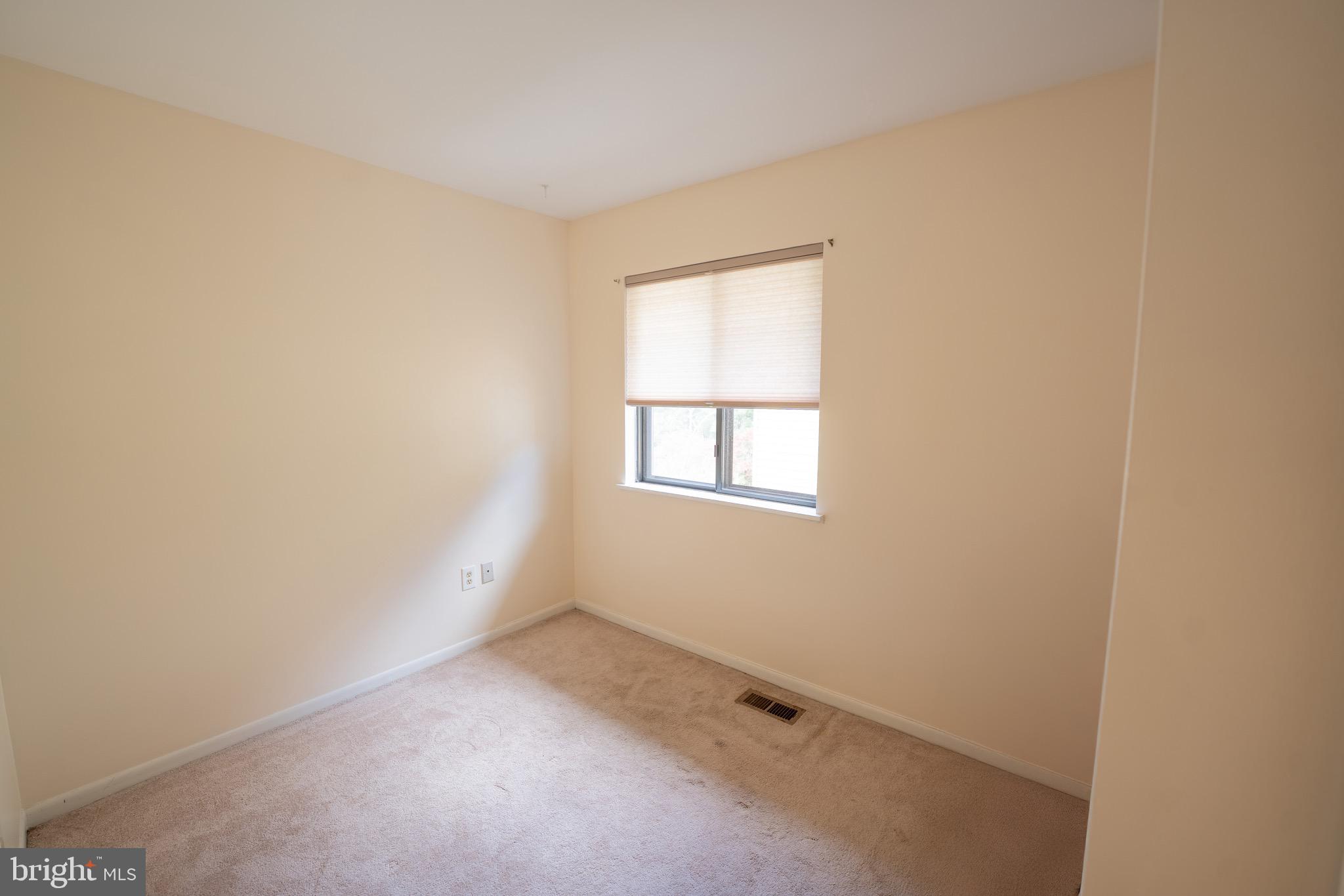10 Brian Court, Unit 242 Gaithersburg, MD 20877 - Photo 18 of 28 an empty room with a window