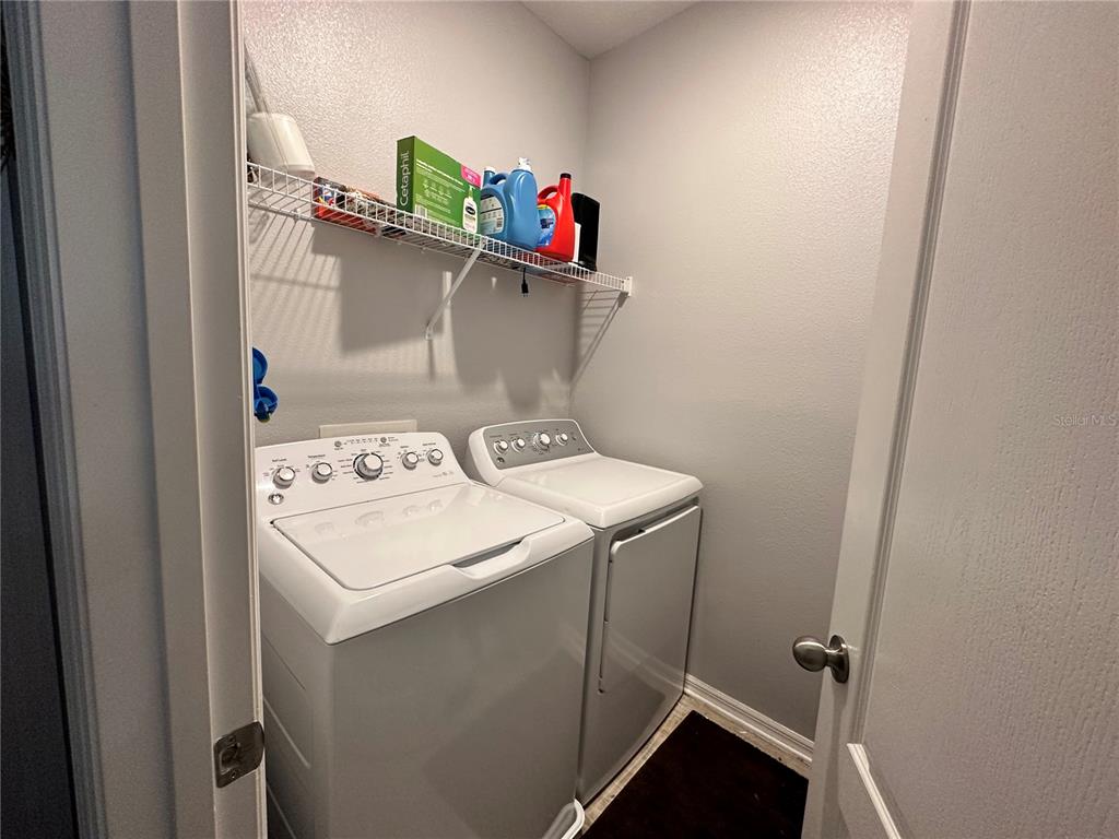 250 Rustic Loop Sanford, FL 32771 - Photo 22 of 33 a utility room with dryer and washer