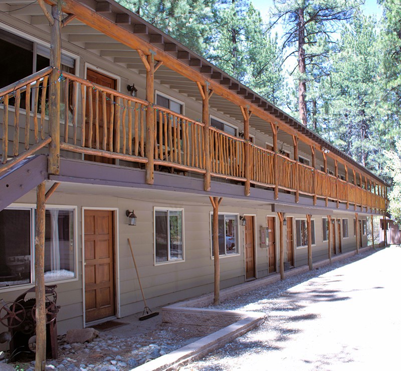 42268 Moonridge Road Big Bear Lake, CA 92315 - Photo 53 of 54 a front view of a building with a yard
