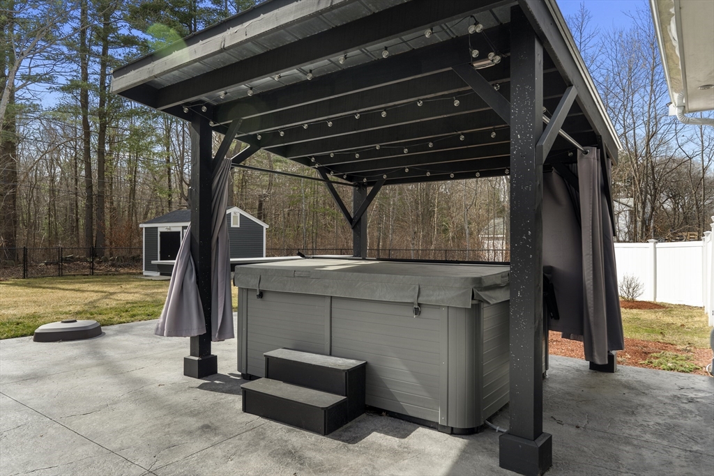 27 Leo's Lane Avon, MA 02322 - Photo 19 of 30 a view of walk in closet with clothes and shoes