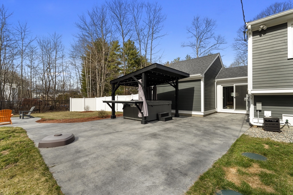 27 Leo's Lane Avon, MA 02322 - Photo 21 of 30 a view of a house with backyard and sitting area