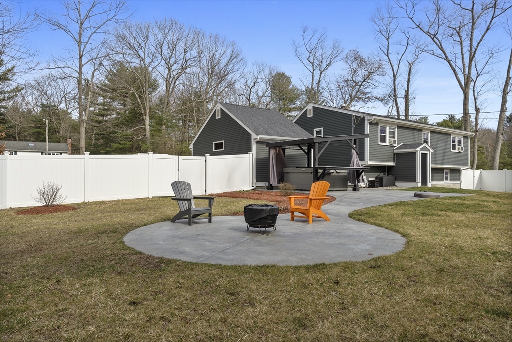 27 Leo's Lane Avon, MA 02322 - Photo 23 of 30 a view of a house with backyard