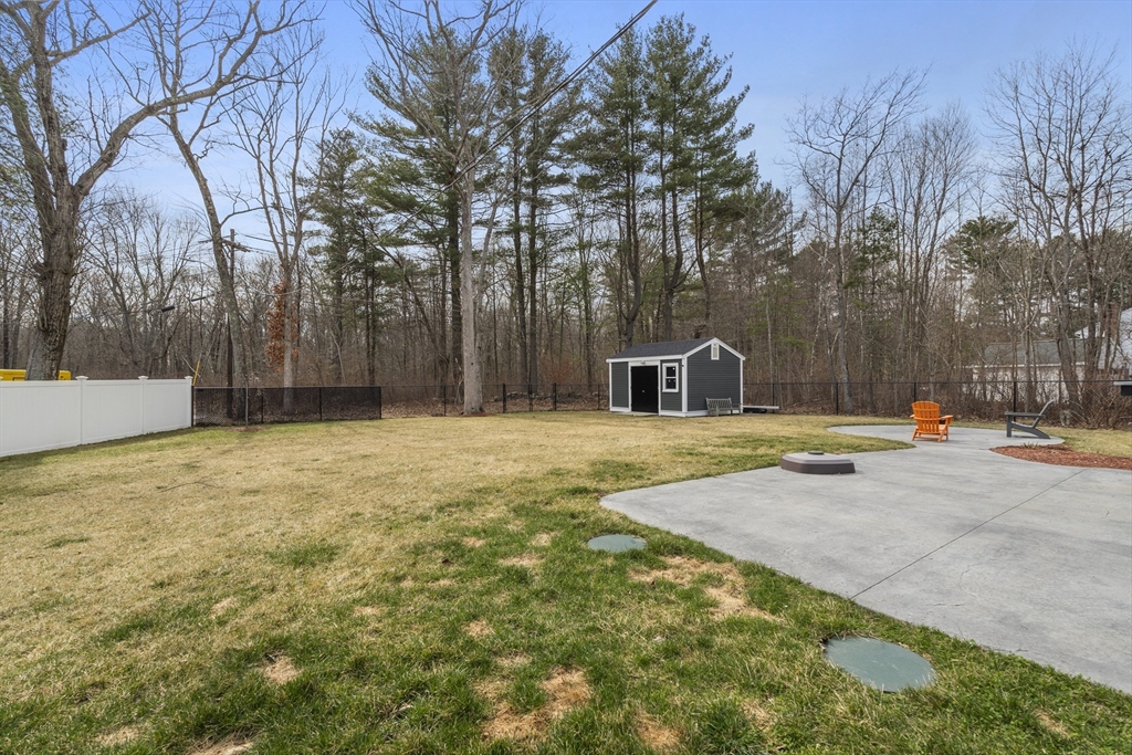 27 Leo's Lane Avon, MA 02322 - Photo 25 of 30 a bathroom with a sink and mirror